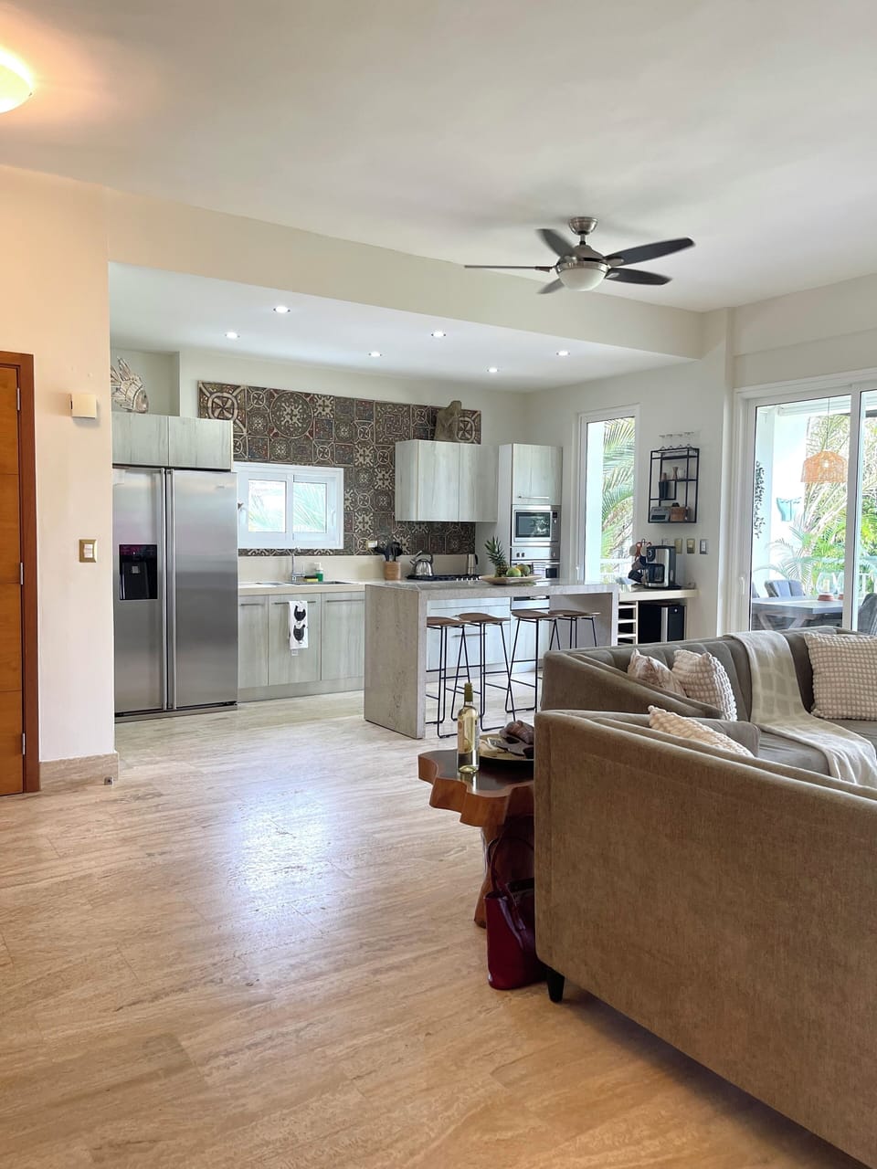 Living area open kitchen with European microwave, oven, stove, dishwasher