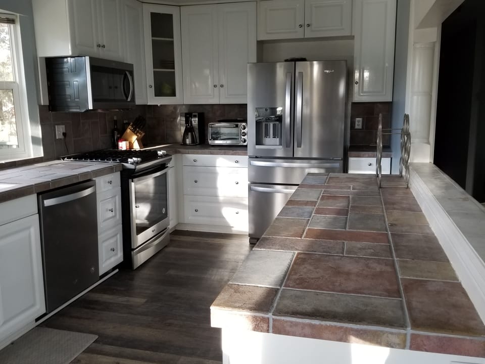 new gas stove w/ full cooking surface & oven, new fridge and washer too