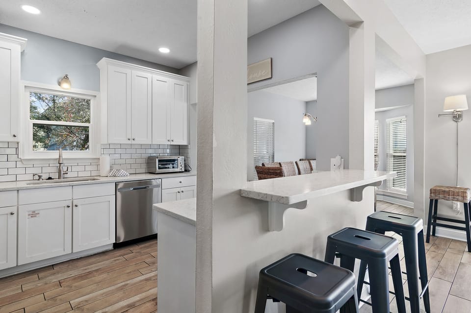 Caribbean Breeze - Seacrest Beach - Second Floor Kitchen, Living Area, and Dining Area