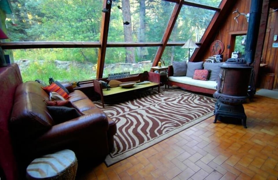 Living room looking out into forest...