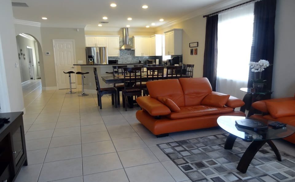 Main living area. Dining tables for 8