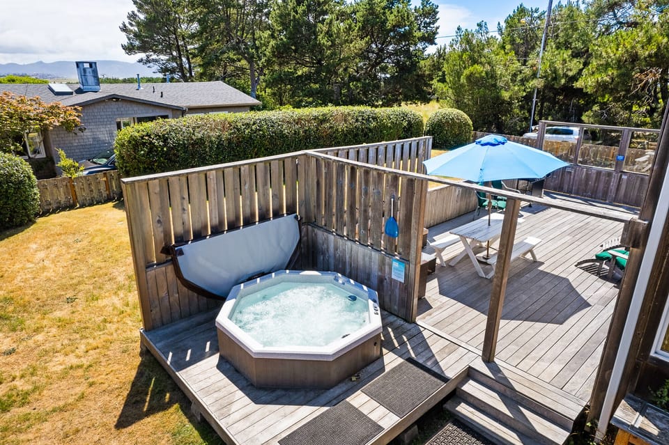 Hot tub is screened and private.  Come enjoy this deck!
