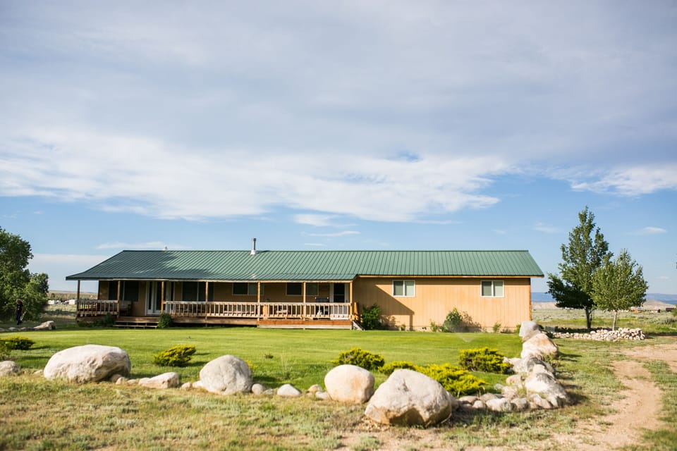 Front of the house with the long porch.