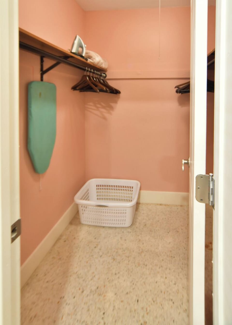Walk in Closet with Iron, Ironing Board, Laundry Basket