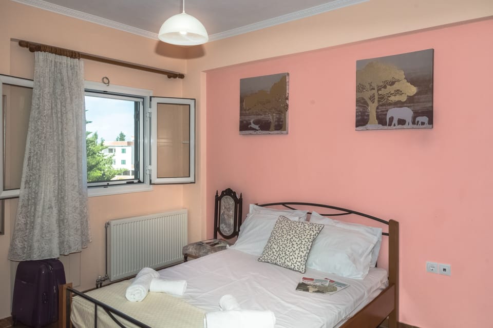 Spacious bedroom with queen bed