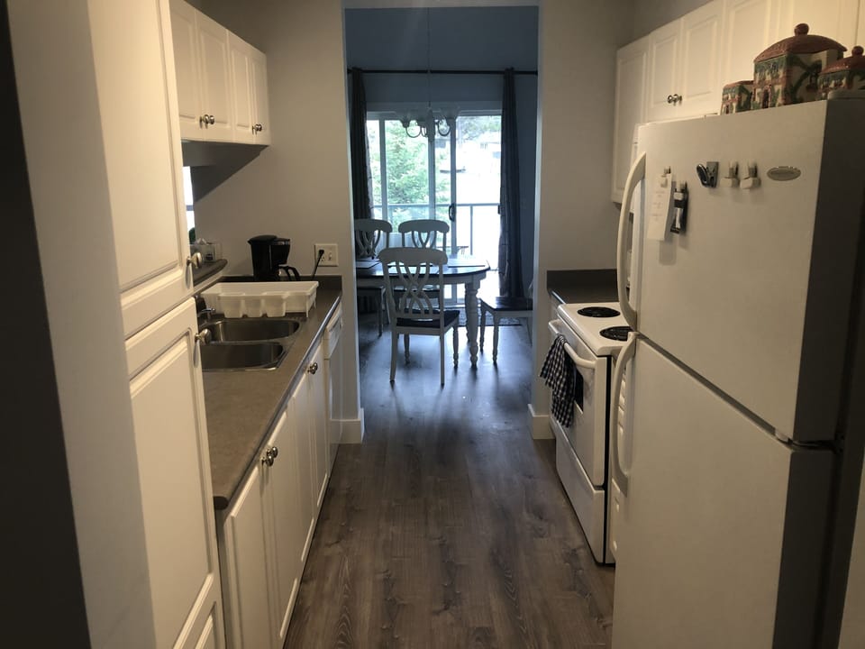 Kitchen, view of Dining Area in background