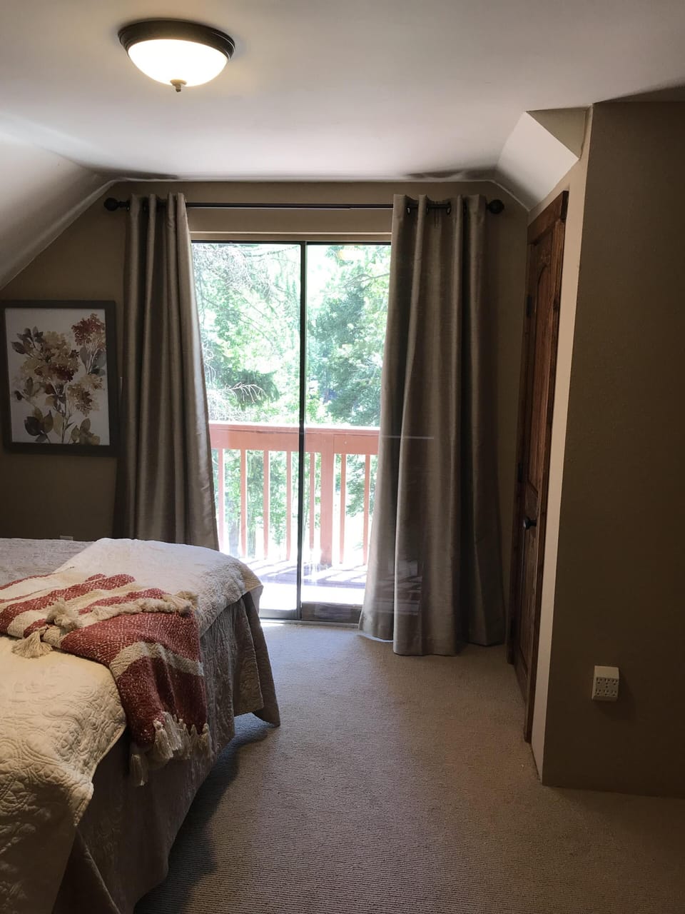  Sliding glass door opens to a small deck to sit and listen to the creek