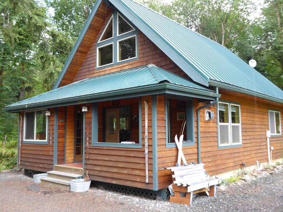 Front of cabin, nice covered porch for ski storage and enjoying the property.