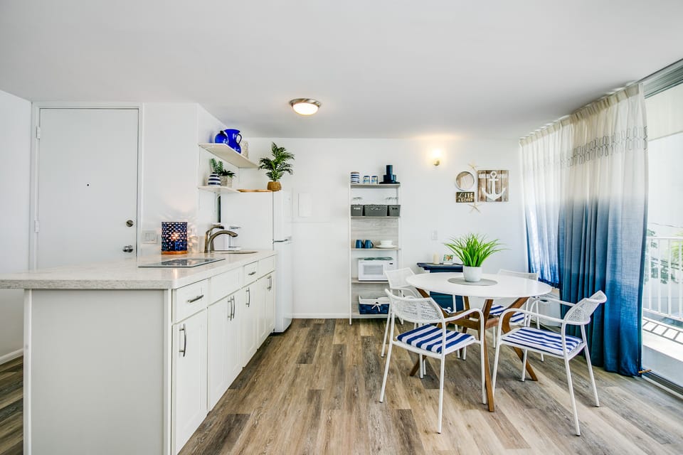 Dining / Work area with seating for four guests