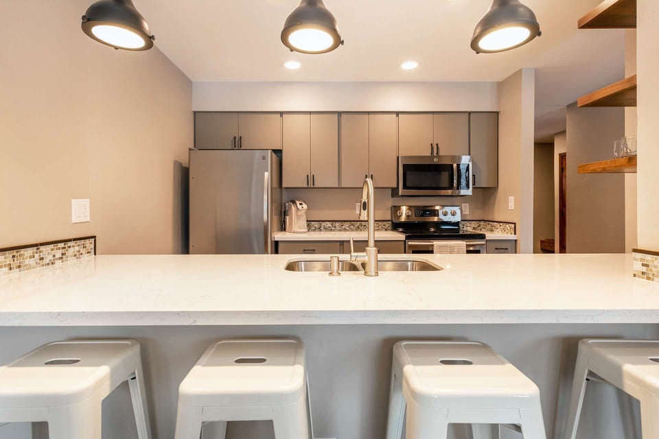 Keep the "chef" of the house company while you watch the kitchen action from the breakfast bar.