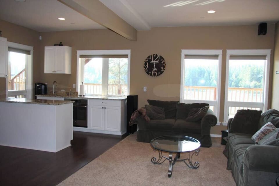 Comfy living room, beautiful views of the lake can be seen from... everywhere!