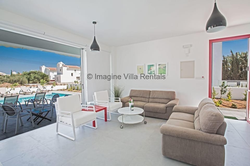 Living room with comfortable seating area and widescreen TV