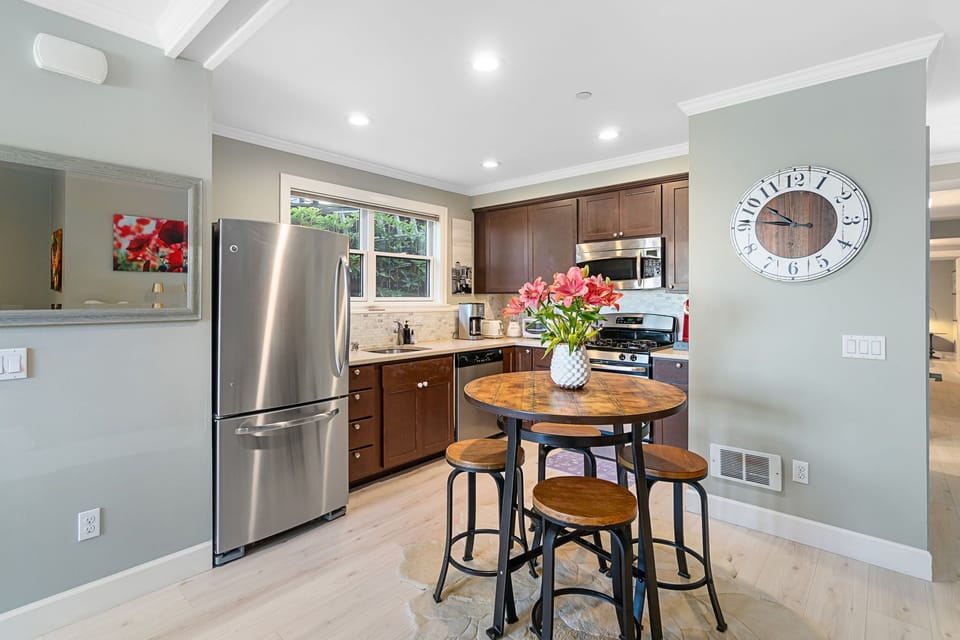 Full kitchen and dining for four. 