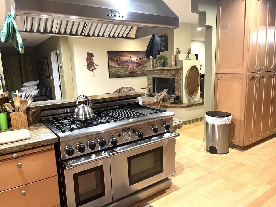 Kitchen - 48" Thermador Double Oven, 4 Burner, Grill & Griddle.  60” Hood
