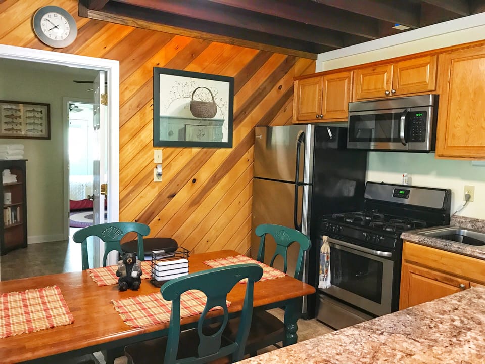 The kitchen has all your necessary appliances, cookware, tableware and utensils