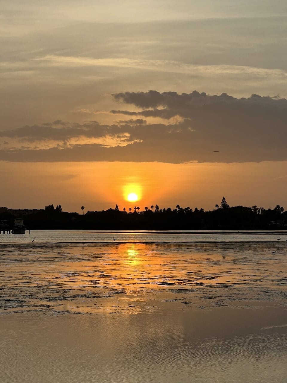 Beautiful sunsets from the condo property patio by the inter coastal waterway. 