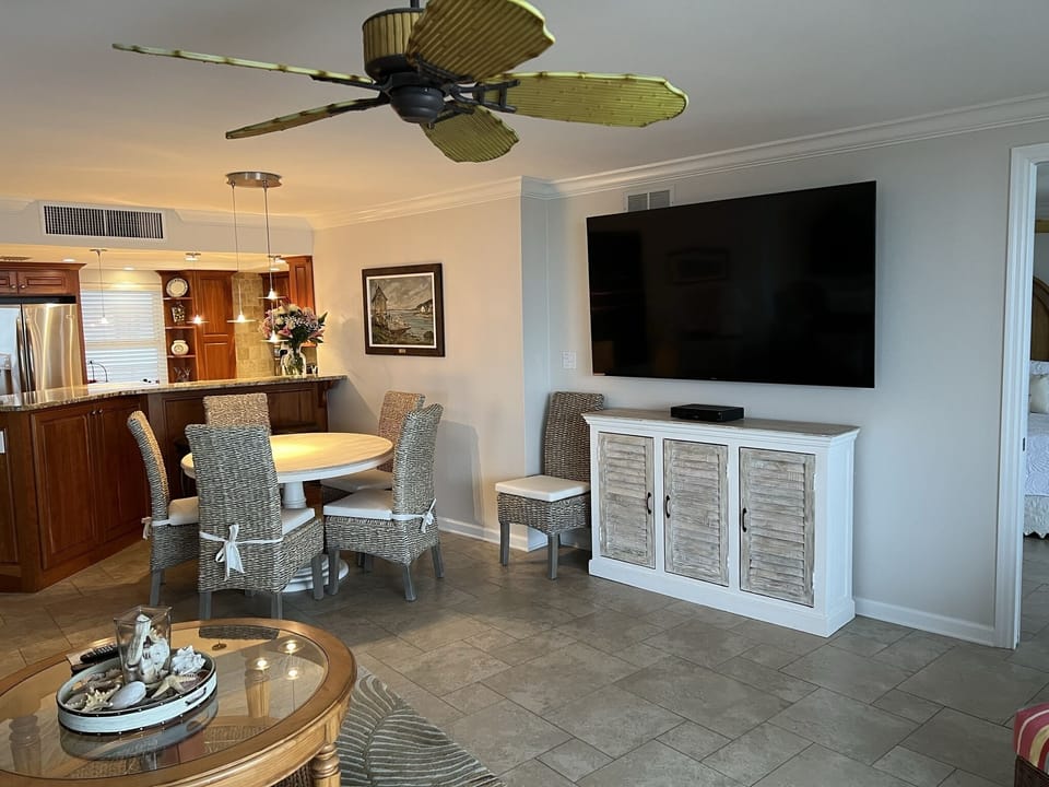 Dining room table, seats 6, with easy view of 75" Smart TV