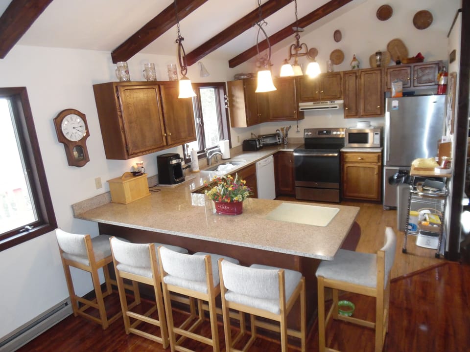 newly renovated kitchen with all new appliances and pots/pans