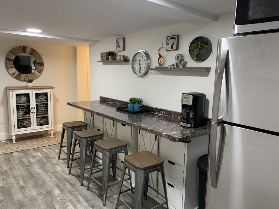 Bar Kitchenette, with new Fridge, microwave, coffee maker, toaster, paper plates