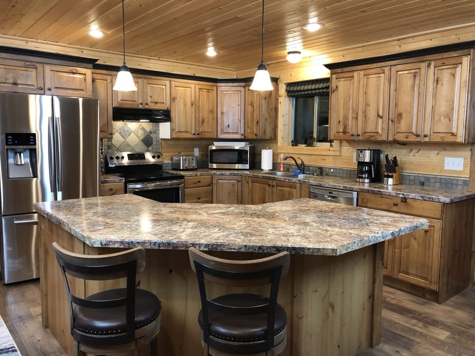 Kitchen with island, lg french door fridge, dishwasher, well stocked, w/spices