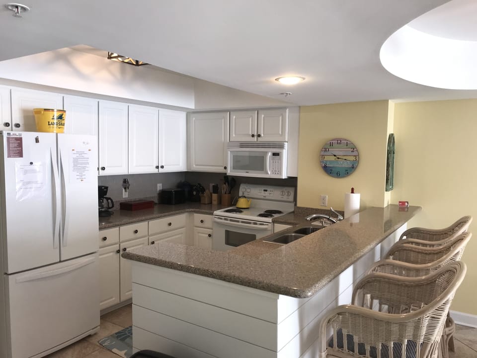 Kitchen with bar seating 