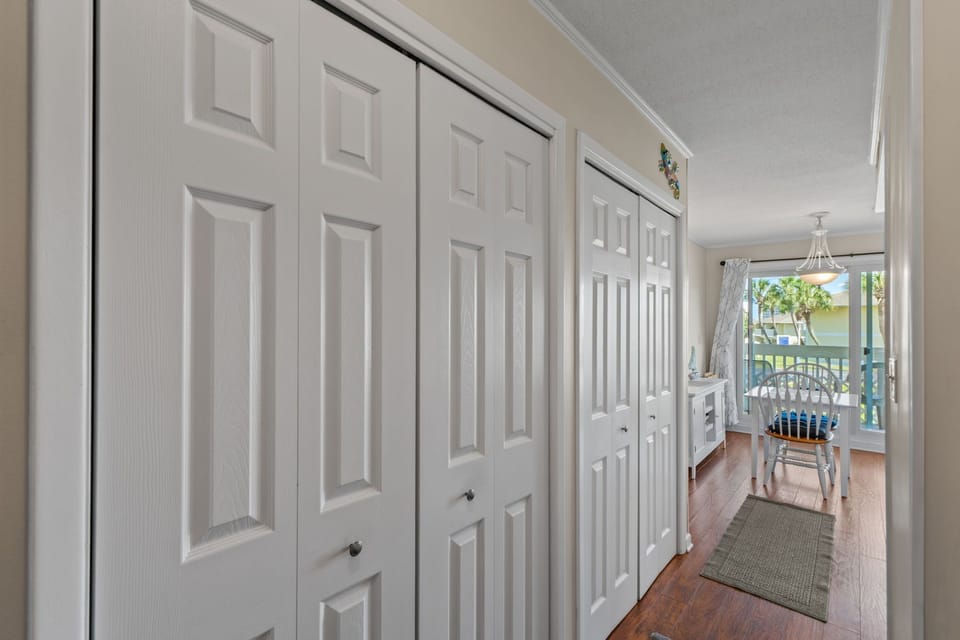 Walk into your bright, welcoming space where plenty of closet storage awaits and a waterfront view beckons beyond.