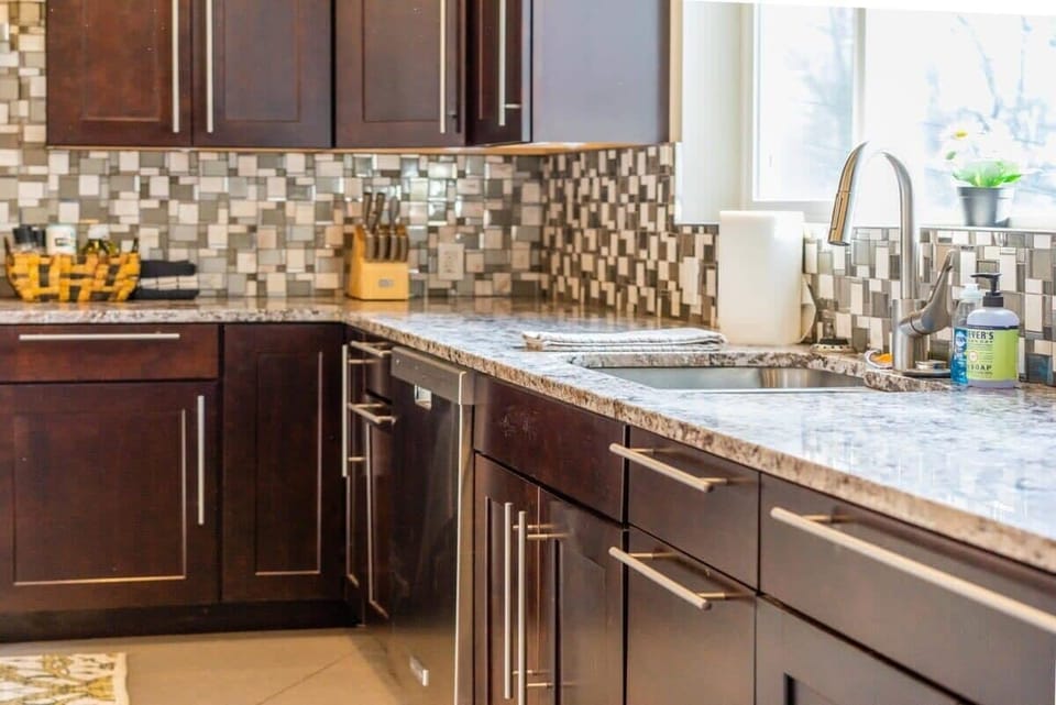 Open up the ample cabinetry where you’ll find all of the required pots, pans, and utensils.