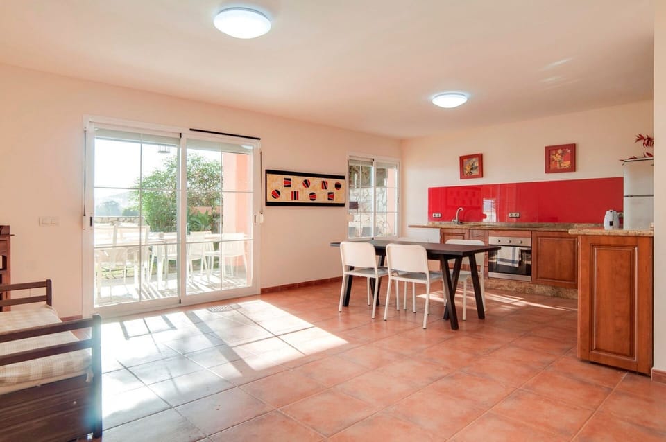 Garden floor with  Kitchen and Entertainment Area, next to fourth bedroom