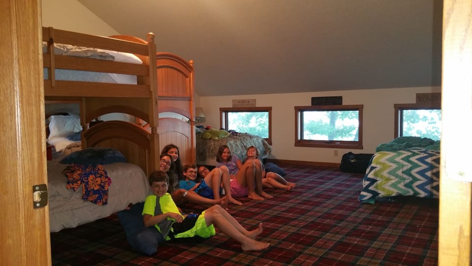 Bunk room with 4 twins, 2 full beds. Shower bathroom and TV. 