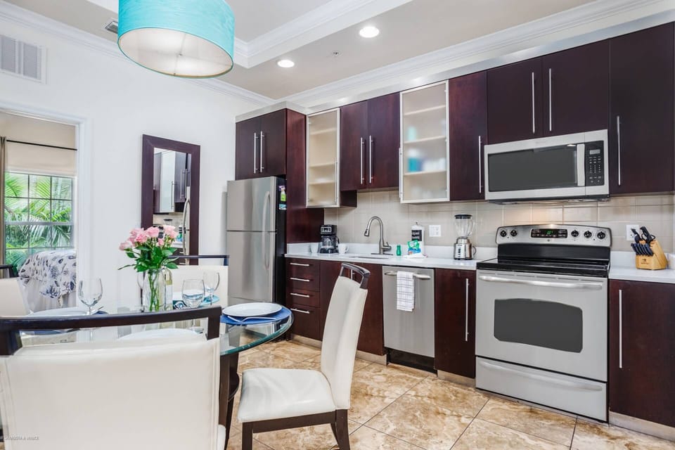 Beautifully updated kitchen with stainless appliances and sit-down dining for 4