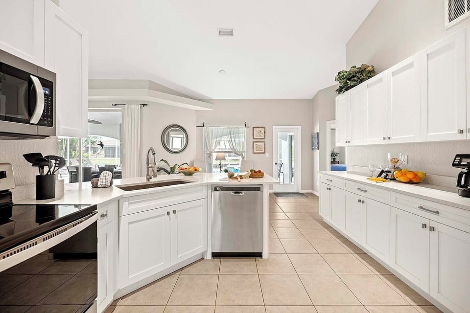 Formal Dining Room Flows into the Kitchen with Large Island