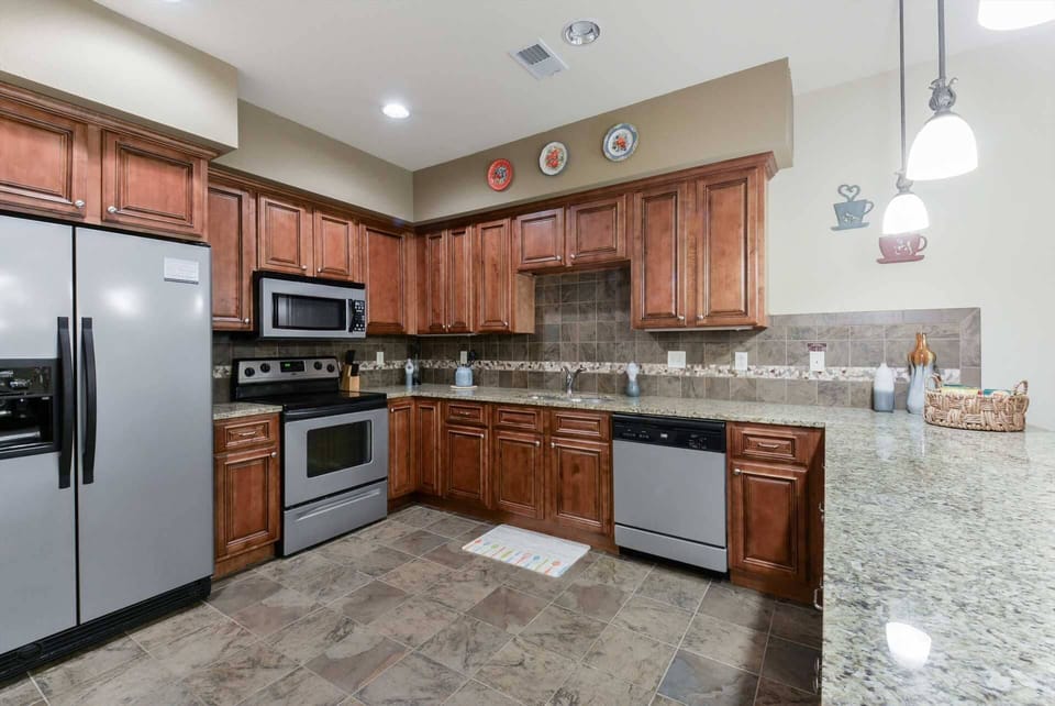 This spacious kitchen comes fully-equipped with everything you need to make your favorite meal.