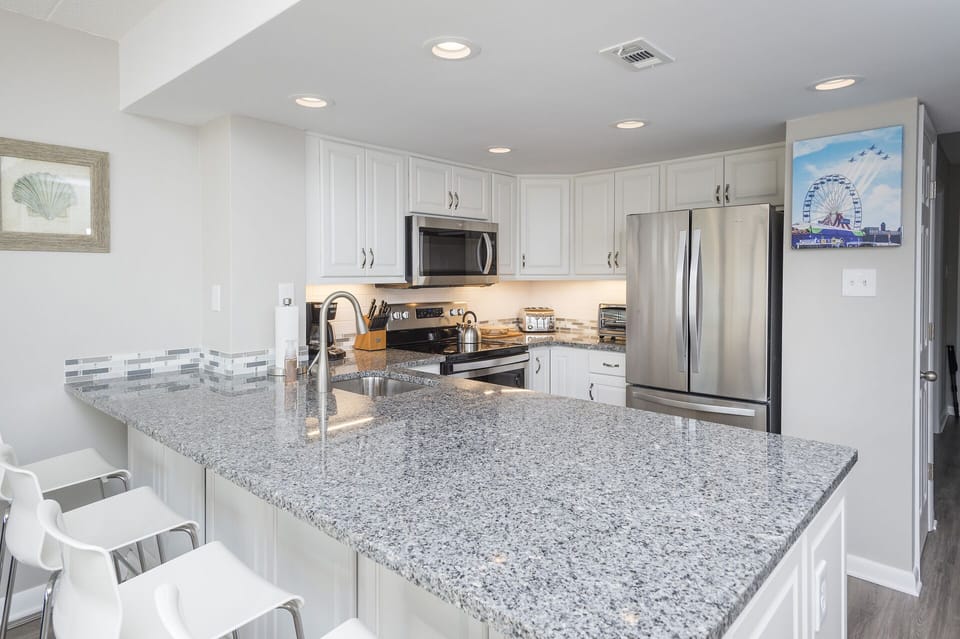 Brand New Kitchen with Granite Countertops & Stainless Appliances.