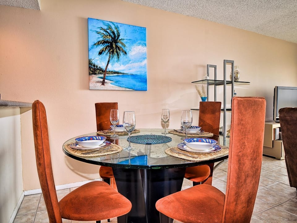 Dining area has seating for 4 guests.