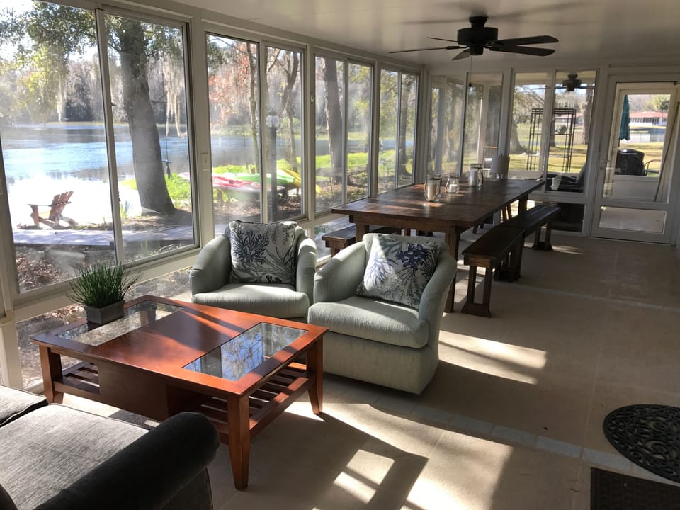 Sunroom (glass enclosed with sliding windows).  Amazing views of the river