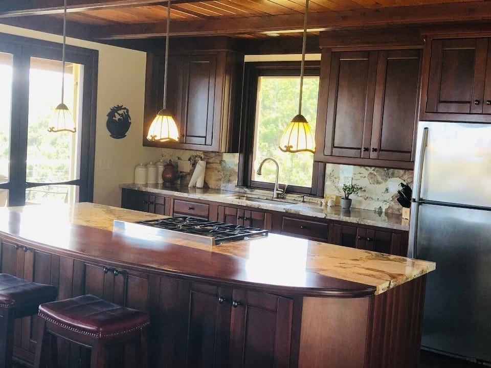 Gorgeous well equipped kitchen with granite counters and stainless appliances.