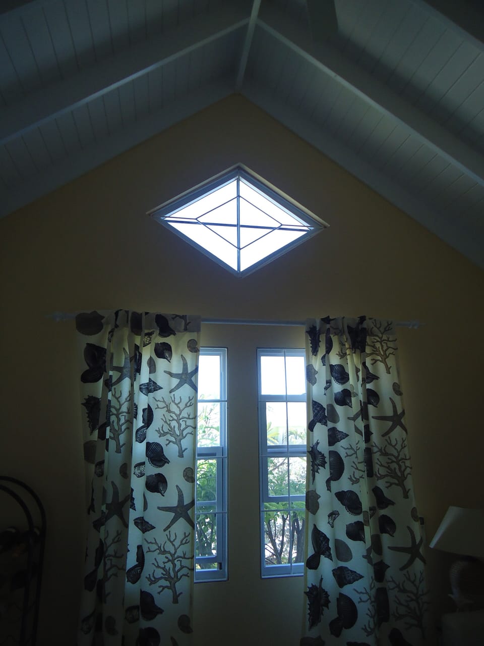 Tall apex ceiling and fan.