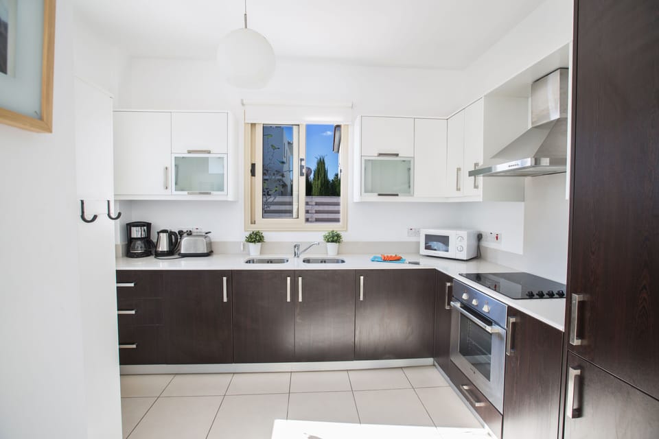 Modern kitchen fully equipped with all appliances and utensils needed