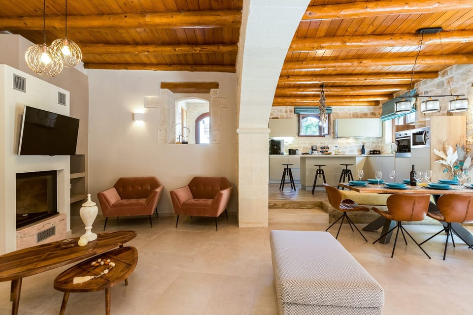 View to the open plan space of kitchen, dining and living room