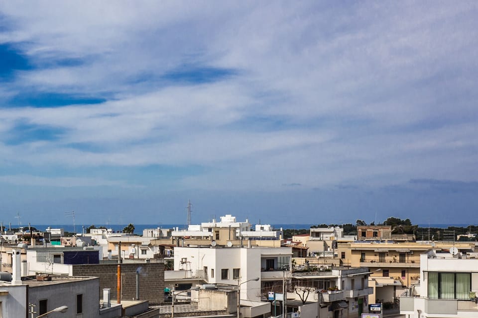 Above the roofs: modern+spacious apartment, near to the sea, penthouse style   Apartment in Carovigno