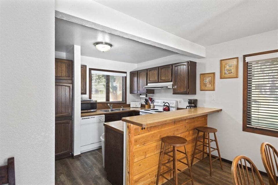 Kitchen with additional seating at the bar