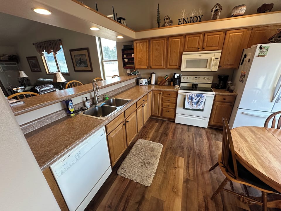 Kitchen is spacious and set up with everything you need to prepare meals.