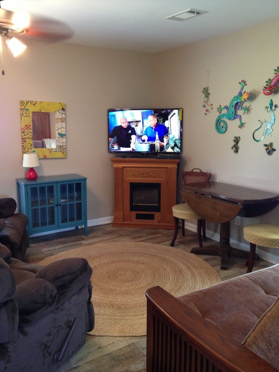 Two rocker recliners with smart TV and Cable and electric fireplace