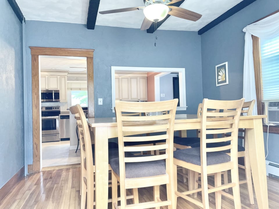 Dining room is off of the kitchen and sits and 8 people