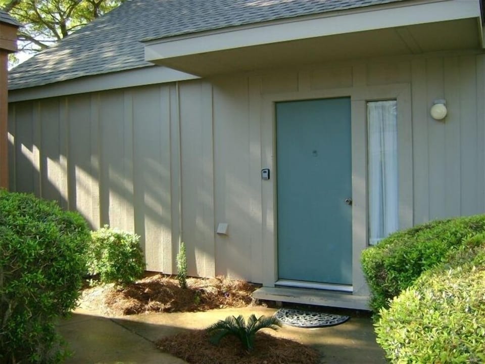 Front Door of Beach Cottage. Ground Level. No Unit Above or Below Gives Privacy.