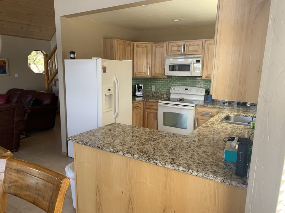 Kitchen has microwave, dishwasher coffee pot, Keurig and many other appliances.