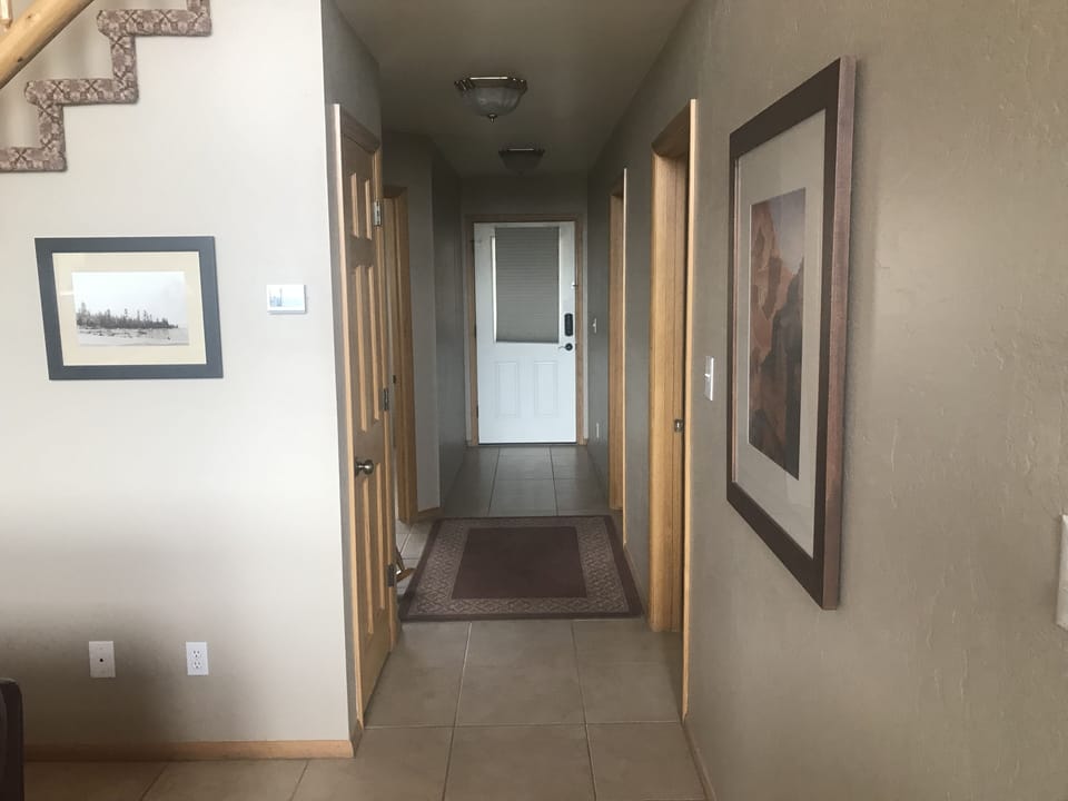 Front entry hallway, Queen b-room on left Twin b-room on right. Bath-rm on right
