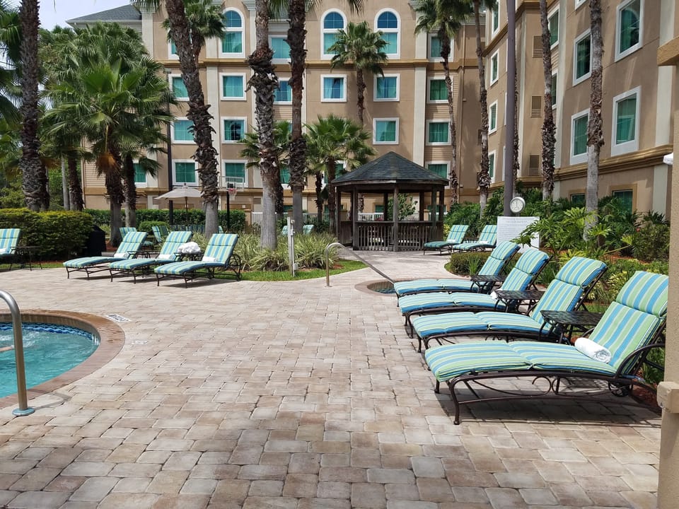 Soak up the sun in the sun loungers around the pool.