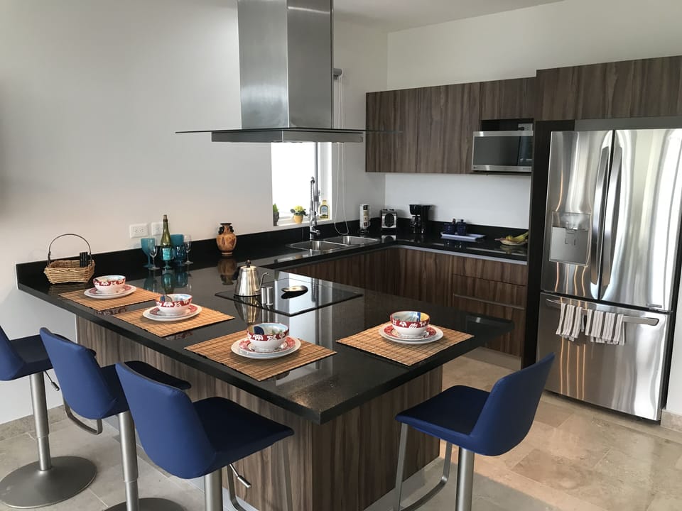Spacious kitchen with all state of the art utensils and equipment