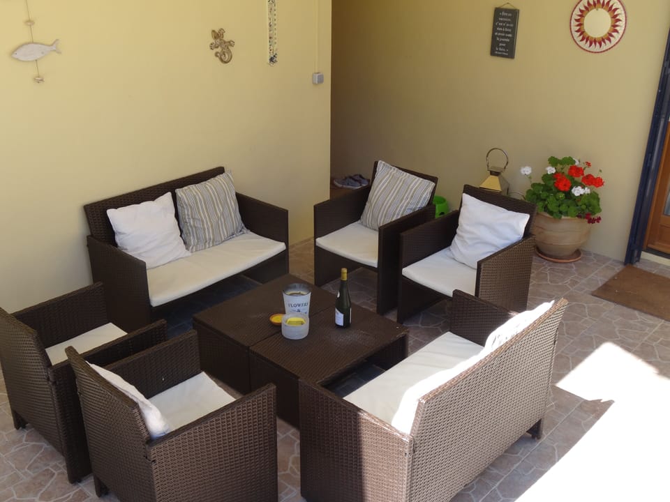 BBQ area with 2 BBQs and fridge
